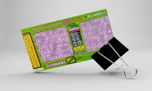 Zdrapka "Krzyżówka XL" z polem do zdrapania, gdzie ukryte są litery kontrolne zdrapki.