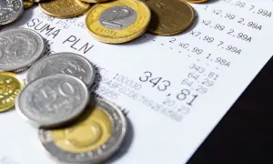 Monety i paragon. Czy loteria paragonowa powróci? Ministerstwo Finansów analizuje dane.