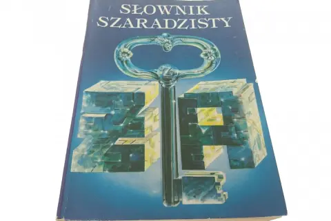 Słownik szaradzisty: klucz do efektywnego szukania trudnych i nietypowych haseł. Okładka z kluczem i kostkami.