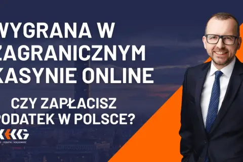 Wygrana w zagranicznym kasynie online. Czy wygrana w zagranicznej loterii podlega podwójnemu opodatkowaniu w Polsce? Mężczyzna w garniturze.
