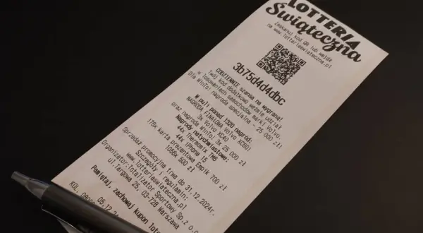Kupon loterii świątecznej z kodem QR do rejestracji. Szansa na wygranie Volvo XC60 i innych nagród.