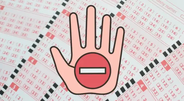 Dłoń z symbolem zakazu na kuponach lotto. Czy pracownicy Totalizatora Sportowego mogą grać w lotto? Nie.