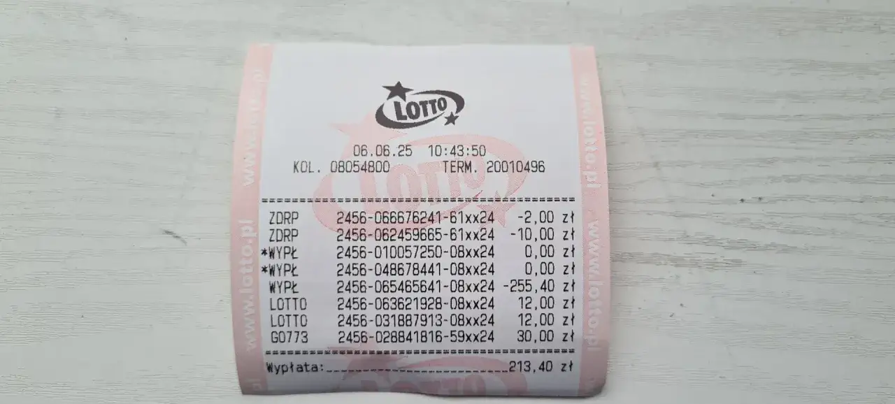 Paragon z gry Lotto. Widoczne kody kuponów, datę, godzinę i kwotę wypłaty.