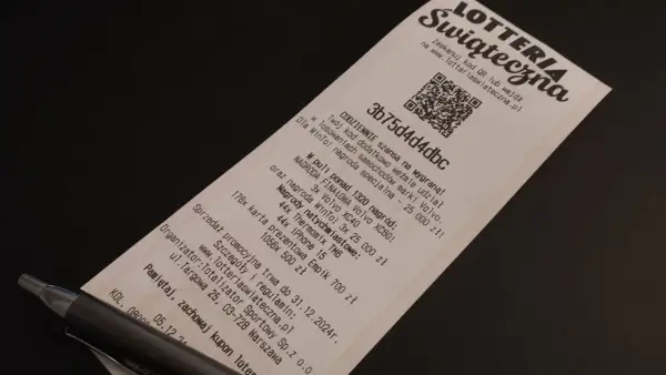 Kupon loterii świątecznej z kodem QR do rejestracji. Szansa na wygranie Volvo XC60 i innych nagród.