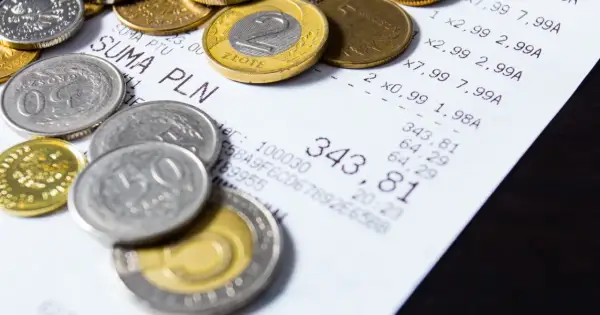 Monety i paragon. Czy loteria paragonowa powróci? Ministerstwo Finansów analizuje dane.